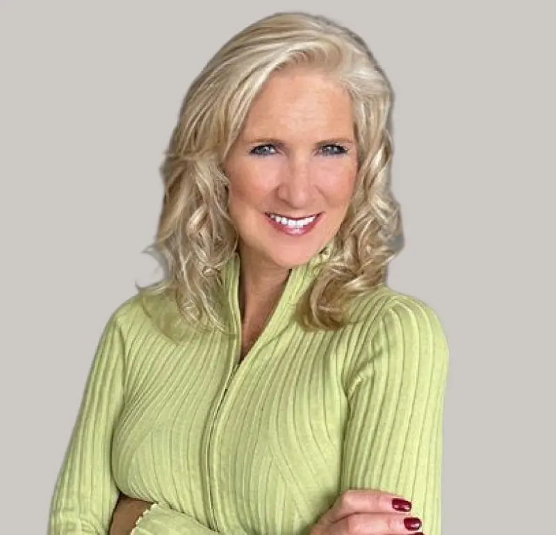 Dr. Melody Baron, dentist at Caloosa Dental Fort Myers, smiling in professional portrait.